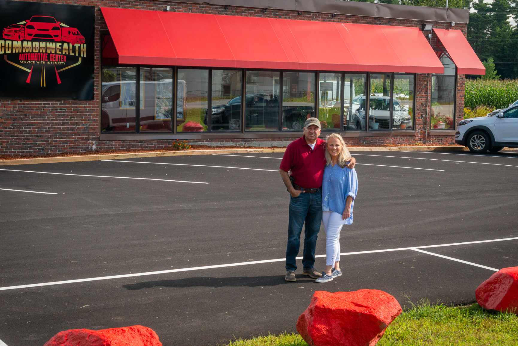 Owners Darius Maurimootoo and Jo Ann Blake outside Commonwealth Automotive Center